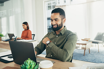 Image showing Businessman, smile and working on laptop in office, email or planning a proposal. Happy worker, sitting and reading a review or analyzing on computer, typing and insight for report, strategy and info