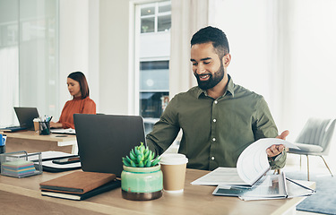 Image showing Business man, documents and computer for audit, finance report and company revenue or budget planning in startup office. Professional worker with accounting documents, laptop and taxes or bookkeeping