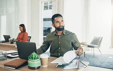 Image showing Business, thinking and man with a laptop, documents and problem solving with brainstorming, decision and planning. Person, employee and entrepreneur with a pc, creative and project with paperwork