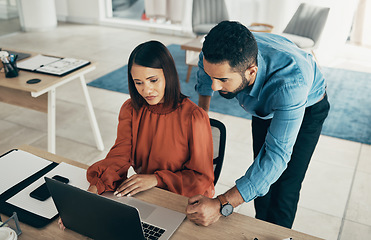 Image showing Employee, manager and office with laptop with creative director, above and feedback on project. Diversity, man and woman for consulting by technology, performance review and concern with job progress