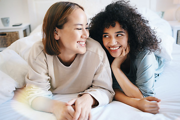 Image showing Lesbian, couple and bedroom for connection or happiness talking, communication or lgbtq. Gay women, connection together and unique queer identity love in apartment, relax or pride in home for morning