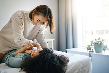 Image showing Home, lesbian and couple with love, bed and funny with bonding, marriage and relax together. Queer people, women and girls with happiness, relationship and care with trust, lgbtq and humor on a bed