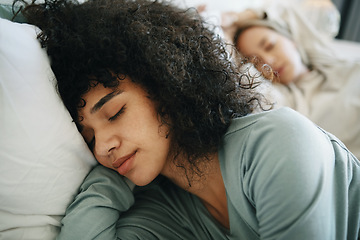 Image showing Lgbtq, relax and women sleeping on bed in bedroom with fatigue and love, dream or tired. Exhausted, people and lesbian couple together in home lying on pillow in apartment for wellness and calm