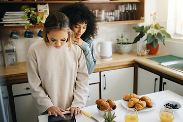 Image showing Lesbian, couple and cooking breakfast in kitchen together in morning with nutrition, love and support in home. Lgbt, women or friends with food, juice and preparing healthy diet on counter in house