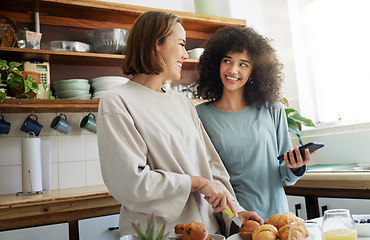 Image showing Lesbian, couple and women with phone and cooking with happiness in kitchen for breakfast and nutrition in morning. Food, people and smile with romance in home or face for wellness, lgbt or love