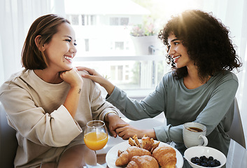 Image showing Breakfast, lgbtq and couple in morning in home eating together for bonding, love and care. Sunrise, lesbian and happy women with food for healthy relationship, nutrition and share meal for romance