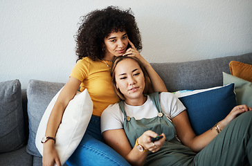 Image showing Love, relax and a gay couple watching tv on a sofa in the living room of their home together. Television, LGBT and a woman with her lesbian girlfriend for movie on a subscription streaming service