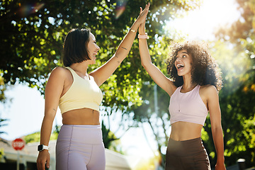 Image showing High five, yoga for fitness and woman friends outdoor together for success, support or motivation. Exercise, teamwork and partnership with young people in celebration as a winner for wellness