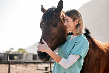 Image showing Horse doctor, care and hug outdoor at farm for health, smile and happy with love for animal in nature. Vet, woman and equine healthcare expert in sunshine, countryside and helping for wellness