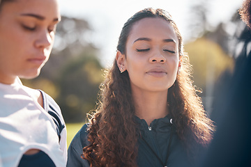 Image showing Cheerleader woman, team face and praying group, relax community and gratitude for sports competition teamwork. Cheerleading faith, eyes closed and solidarity, contest hope and pray for wellness