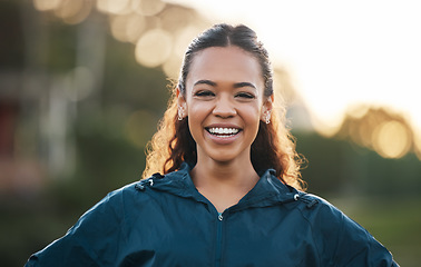 Image showing Woman coach, sports and portrait in field, smile and excited for teaching, fitness and wellness in summer. Training mentor, happy and outdoor for exercise, workout or athlete development in sunshine