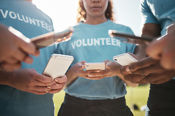 Image showing Volunteer, park and hands of people with phone for social media, online chat and charity website. Community service, teamwork and men and women typing on smartphone outdoor for recycle cleaning blog