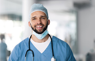 Image showing Portrait of man, surgeon in hospital with smile and ppe, healthcare worker with confidence in medicine and help. Health expert, medical professional and happy face of doctor in clinic for surgery.