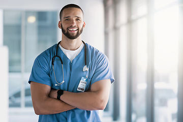 Image showing Man, portrait and surgeon with arms crossed in hospital for wellness services, help and medical consulting in Mexico. Medicine, healthcare and happy professional doctor working with trust in clinic