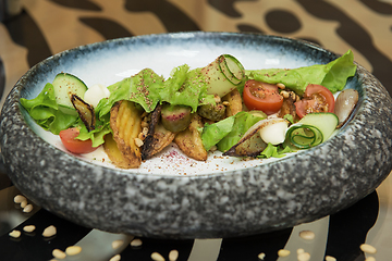 Image showing Salad with fried potato