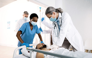 Image showing CPR, emergency and doctor with patient for first aid, medical service and surgery in hospital. Healthcare, teamwork and person do chest compressions for injury, serious accident or wellness in clinic