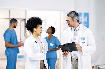 Image showing Doctors, nurses and checklist for teamwork, medical results and mentor planning or talking of hospital or clinic schedule. Healthcare worker, student or people writing with folder, notes and charts
