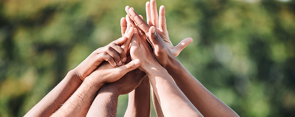 Image showing People, teamwork and high five in nature, support or collaboration for motivation or outdoor goals. Closeup of group hands together in team building, solidarity or trust in unity or community outside