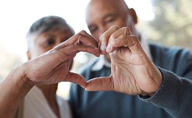 Image showing Marriage, heart hands and senior couple with care, romance and romance with bonding, relationship and retirement. Face, old woman and elderly man with love symbol, kindness and health with trust