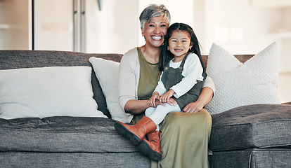 Image showing Portrait, love and grandmother with child on sofa together for bonding, connection and care in living room of home. Happy family, woman and girl on couch with happiness for relaxing, weekend and face
