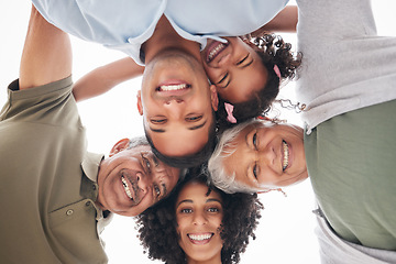 Image showing Happy family, circle and portrait from below with love, care and bonding outdoor together. Face, smile and girl child with parents, grandparents or hug outside with freedom, fun and low angle support