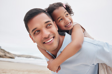 Image showing Beach, piggy back or happy dad with child in nature to enjoy a family holiday vacation in New Zealand. Travel, hug or proud father at sea or ocean with smile, kid or girl to relax or bond together