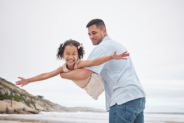 Image showing Beach, airplane and girl child with father in nature happy, bond and having fun together. Flying, freedom and face and kid with parent at the ocean with love, support and games, care or trust outdoor