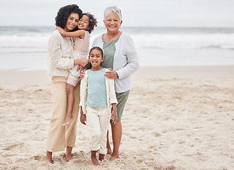 Image showing Beach, grandma or portrait of mom with happy kids in nature on family holiday vacation in New Zealand. Travel, hug or senior mother at sea or ocean with woman, kid or girls to relax or bond together