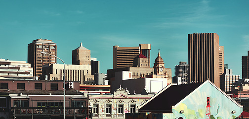 Image showing City, buildings and architecture with landscape for urban infrastructure or skyscraper outdoor in New York. Development, town and skyline with cityscape, tower and hotel with modern exterior or roof