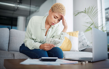 Image showing Woman, headache and stress for money, home budget or income on sofa with inflation, rent or bills. African person with depression, sad or confused for laptop cash debt, loan payment or cost of living