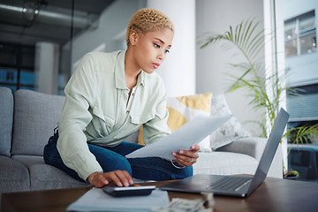 Image showing Finance, calculator and woman with a laptop, document or bills with budget planning, home and inflation. Person, paperwork or girl on a sofa, pc or review financial profile with tax and economy