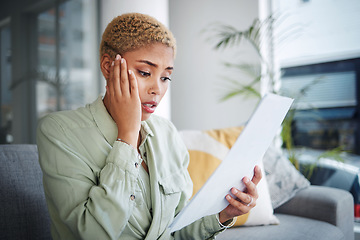 Image showing Home, finance and woman with document, stress and shock with budget planning, debt and inflation. Person, paperwork or girl on a sofa, loan or review finances with accounting, frustrated and economy