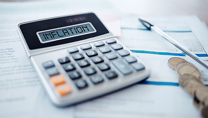 Image showing Inflation, calculator and financial crisis document with money, coins or finance problem in the economy crash. Paperwork, accounting and information on stock exchange for bad investment or budget