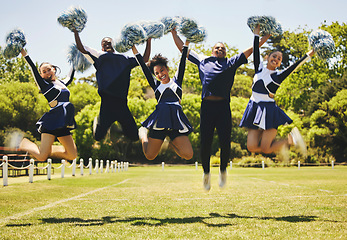 Image showing Cheerleader team portrait, people and jump for performance on field outdoor in training, celebration or exercise. Happy, cheerleading group and energy for support at event, sport competition and blur