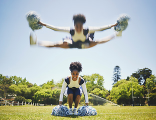 Image showing Portrait, cheerleader or girl in jump motion on field for fitness training in outdoor workout for performance. Smile, blur or happy sports woman on grass for motivation, inspiration or support