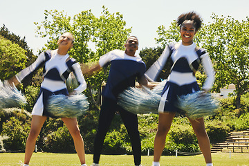 Image showing Cheerleading team, blur and portrait of people in dance performance on field outdoor for exercise, formation or training. Smile, cheerleader group and support at event, sport competition and energy