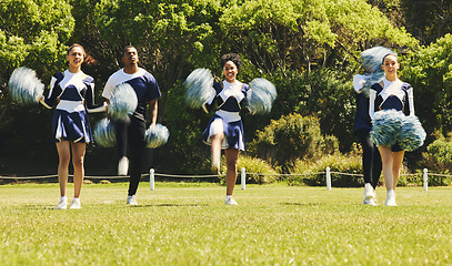Image showing Motion blur, motivation and a cheerleader group of young people outdoor for a training routine or sports event. Smile, teamwork and diversity with a happy cheer squad on a field together for support