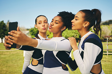 Image showing Field, women or cheerleaders in team selfie at a game with support in sports training, exercise or fitness workout. Female athletes, teamwork or young people in a social media picture or group photo