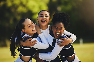 Image showing Teamwork, hug or portrait of cheerleader with people outdoor in training or sports event together. Celebrate, smile or proud girl by a happy cheer squad group on field for support, winning or fitness