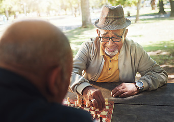 Image showing Friends, senior and game of chess outdoor and happy or playing with strategy or thinking challenge in retirement. Winning, boardgame and elderly person with king in checkmate in park, woods or nature