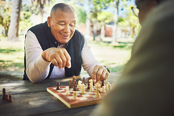 Image showing Happy, table and people in nature for chess, strategy and relax with a sport together. Smile, thinking and elderly or senior friends in retirement with games in a park on a board for competition