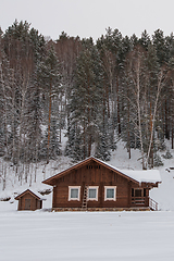 Image showing Winter holiday house in forest.