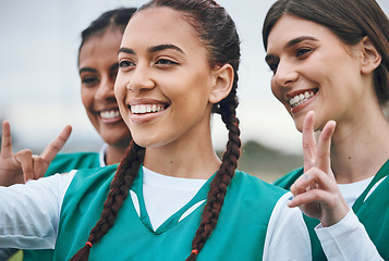 Image showing Selfie, women or sports team with peace after a game with support in hockey training, exercise or fitness workout. Smile, teamwork or happy people in a social media picture or group with hand gesture