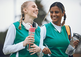 Image showing Happy, team sports or women in conversation on turf or court for break after fitness, training or exercise. Smile, funny girl or female hockey players walking, laughing or talking to relax together