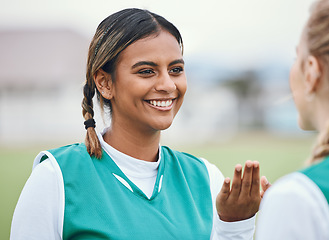 Image showing Woman, sport field and smile for hockey or game for competition for exercise, training or fitness. Female athlete, exercise clothes and outdoor contest in sun for workout, strong or cardio for health