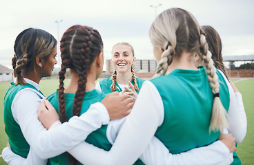 Image showing Sport, women and group in circle for team building, solidarity and diversity on field outdoor in nature. Hockey, girls and hug for unity, teamwork and game discussion with happiness and collaboration