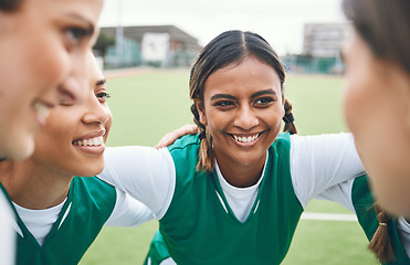Image showing Happy, woman and team huddle in sports, game or conversation on field for advice match in soccer competition. Football player, group and support in exercise, workout or training together on grass