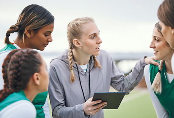 Image showing Coach, sports women or team planning tactics or strategy in a hockey training game, conversation or match. Tablet, talking or athletes in practice for fitness exercise together for teamwork in group