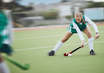 Image showing Hockey, athlete and woman running in game, tournament or competition with ball, stick and action on artificial grass. Sports, training and women play in exercise, workout or motion on the ground