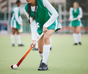 Image showing Woman athlete, hockey and field with fast exercise for game goal training or running, workout on grass turf. Professional sports person, fitness competition or strong cardio health, challenge in play